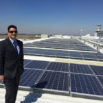 Krishan Tangri, General Manager of Assets pictured in front of new Brisbane Airport solar array