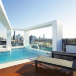 Omega Apartments rooftop pool overlooking Brisbane's CBD